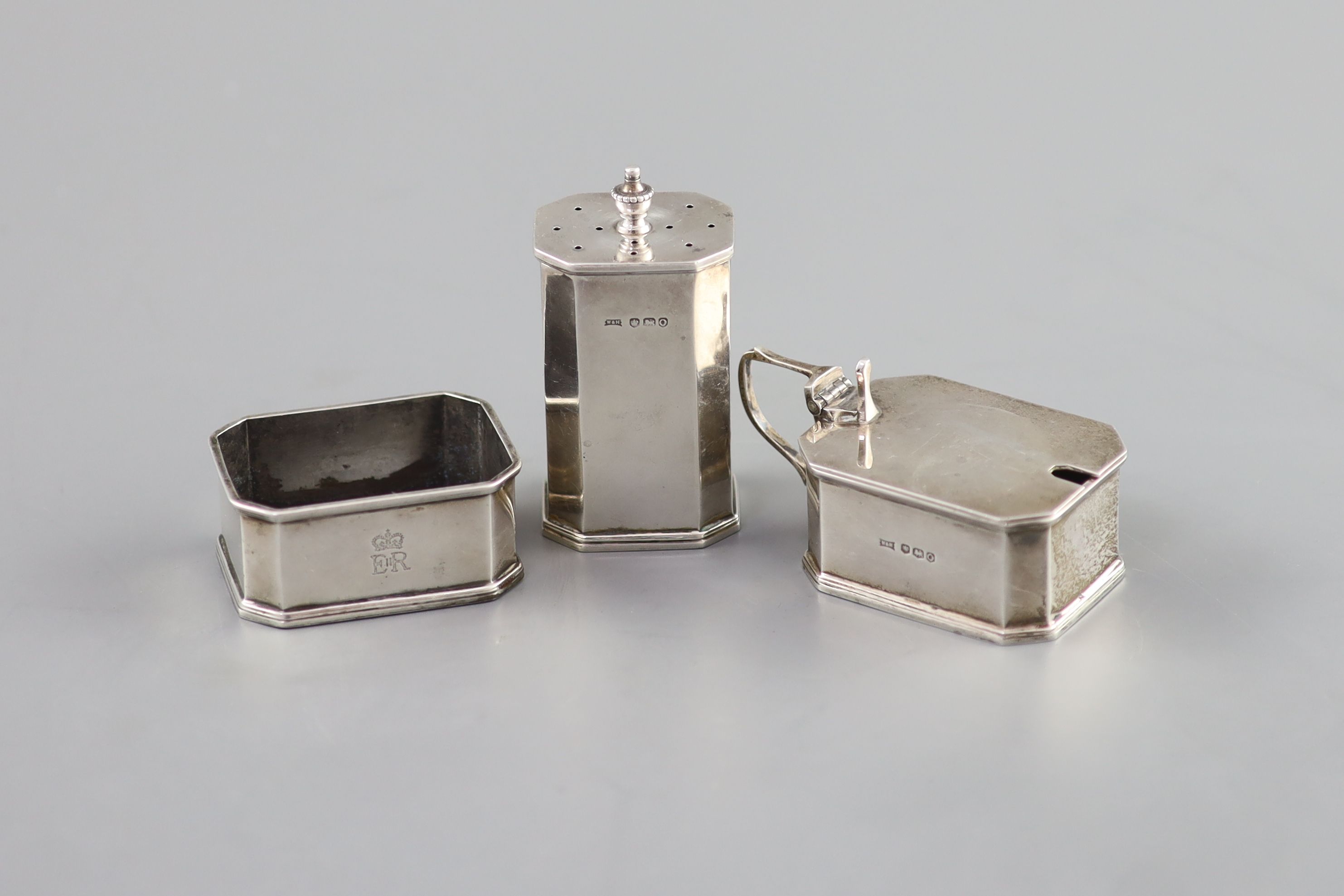 Royal Interest - a three piece silver cruet set, engraved with Queen Elizabeth II Cypher, Walker & Hall 1956?